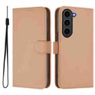 For Samsung Galaxy S23 FE 5G Skin Feel Solid Color Leather Phone Case with Lanyard(Nude) - 2