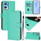 For OPPO Reno7 5G Global Skin Feel Solid Color Leather Phone Case with Lanyard(Green) - 1