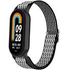 For Xiaomi Smart Band 9 / 8 Plastic Plug Wave Elastic Nylon Watch Band(Black White) - 1