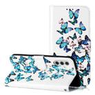 For Samsung Galaxy A16 4G / 5G Colored Drawing Marble Pattern Leather Phone Case(Little Blue Butterflies) - 1