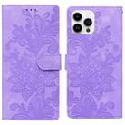 For iPhone 14 Pro Lace Floral Embossed Magnetic Buckle PU Phone Case With Wrist Strap(Purple) - 1