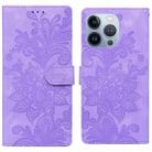 For iPhone 14 Pro Max Lace Floral Embossed Magnetic Buckle PU Phone Case With Wrist Strap(Purple) - 1