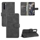 For OnePlus Nord Solid Color Skin Feel Magnetic Buckle Horizontal Flip Calf Texture PU Leather Case with Holder & Card Slots & Wallet(Black) - 1