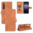 For Sony Xperia 1 II Solid Color Skin Feel Magnetic Buckle Horizontal Flip Calf Texture PU Leather Case with Holder & Card Slots & Wallet(Brown) - 1