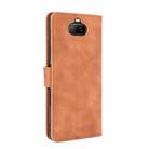 For Sony Xperia 8 Solid Color Skin Feel Magnetic Buckle Horizontal Flip Calf Texture PU Leather Case with Holder & Card Slots & Wallet(Brown) - 3