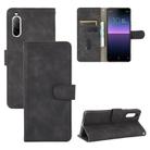 For Sony Xperia 10 II Solid Color Skin Feel Magnetic Buckle Horizontal Flip Calf Texture PU Leather Case with Holder & Card Slots & Wallet(Black) - 1