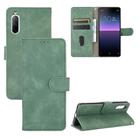 For Sony Xperia 10 II Solid Color Skin Feel Magnetic Buckle Horizontal Flip Calf Texture PU Leather Case with Holder & Card Slots & Wallet(Green) - 1