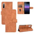 For Sony Xperia 10 II Solid Color Skin Feel Magnetic Buckle Horizontal Flip Calf Texture PU Leather Case with Holder & Card Slots & Wallet(Brown) - 1