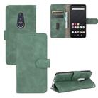 For Fujitsu Arrows Be4 (F-41A) Solid Color Skin Feel Magnetic Buckle Horizontal Flip Calf Texture PU Leather Case with Holder & Card Slots & Wallet(Green) - 1