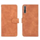 For Huawei Y8p / Enjoy 10s Solid Color Skin Feel Magnetic Buckle Horizontal Flip Calf Texture PU Leather Case with Holder & Card Slots & Wallet(Brown) - 1