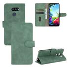 For LG K40S Solid Color Skin Feel Magnetic Buckle Horizontal Flip Calf Texture PU Leather Case with Holder & Card Slots & Wallet(Green) - 1