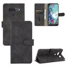 For LG Q70 Solid Color Skin Feel Magnetic Buckle Horizontal Flip Calf Texture PU Leather Case with Holder & Card Slots & Wallet(Black) - 1