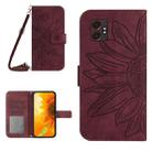 For Samsung Galaxy XCover7 Pro Skin Feel Sun Flower Embossed Flip Leather Phone Case with Lanyard(Wine Red) - 1