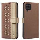 For Samsung Galaxy A12 Splicing Color Hollow Flower Pattern RFID Leather Phone Case(Brown) - 1