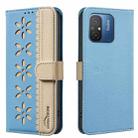 For Xiaomi Poco C55 Splicing Color Hollow Flower Pattern RFID Leather Phone Case(Baby Blue) - 1
