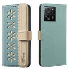 For Xiaomi 13T Splicing Color Hollow Flower Pattern RFID Leather Phone Case(Green) - 1
