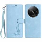 For Redmi A3 Skin Feel Embossed Feather Leather Phone Case(Light Blue) - 1