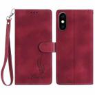 For iPhone XS Max Skin Feel Embossed Feather Leather Phone Case(Red) - 1