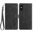 For iPhone XS / X Skin Feel Embossed Feather Leather Phone Case(Black) - 1