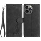 For iPhone 12 / 12 Pro Skin Feel Embossed Feather Leather Phone Case(Black) - 1