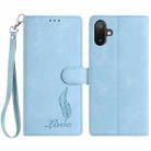 For Samsung Galaxy F06 5G Skin Feel Embossed Feather Leather Phone Case(Light Blue) - 1