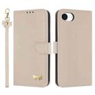 For iPhone 16e Metal Bow Leather Phone Case with Hand Strap(Apricot) - 1