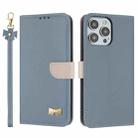 For iPhone 15 Pro Metal Bow Leather Phone Case with Hand Strap(Light Blue) - 1