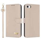 For iPhone 7 / 8 / SE 2022 Metal Bow Leather Phone Case with Hand Strap(Apricot) - 1