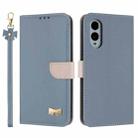 For Fujitsu Arrows We2 F-52E Metal Bow Leather Phone Case with Hand Strap(Light Blue) - 1