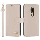 For Fujitsu Rakuraku F-53E Metal Bow Leather Phone Case with Hand Strap(Apricot) - 1