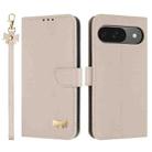 For Google Pixel 10 Pro / 9 Pro Metal Bow Leather Phone Case with Hand Strap(Apricot) - 1