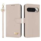 For Google Pixel 10 Pro XL / 9 Pro XL Metal Bow Leather Phone Case with Hand Strap(Apricot) - 1
