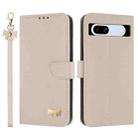 For Google Pixel 7a Metal Bow Leather Phone Case with Hand Strap(Apricot) - 1