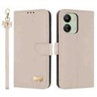 For Redmi 13C 4G Global Metal Bow Leather Phone Case with Hand Strap(Apricot) - 1