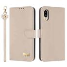 For Sharp Simple Sumaho 6 SHG09 Metal Bow Leather Phone Case with Hand Strap(Apricot) - 1