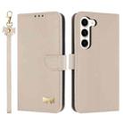 For Samsung Galaxy S23 5G Metal Bow Leather Phone Case with Hand Strap(Apricot) - 1