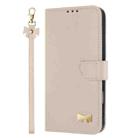 For Samsung Galaxy A06  / A07 4G Metal Bow Leather Phone Case with Hand Strap(Apricot) - 2