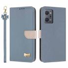 For OPPO Reno7 A / Reno9 A Metal Bow Leather Phone Case with Hand Strap(Light Blue) - 1