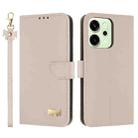 For OPPO Reno14 Pro 5G Metal Bow Leather Phone Case with Hand Strap(Apricot) - 1