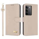 For Realme C75 4G Global / P3x Metal Bow Leather Phone Case with Hand Strap(Apricot) - 1