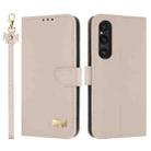 For Sony Xperia 1 V Metal Bow Leather Phone Case with Hand Strap(Apricot) - 1
