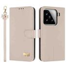 For Xiaomi 15 Metal Bow Leather Phone Case with Hand Strap(Apricot) - 1