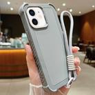 For iPhone 12 / 12 Pro Solid Color TPU Hybrid PC Shockproof Phone Case with Wrist Strap(Grey) - 1
