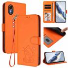 For Samsung Galaxy XCover7 5G Embossed Heart Cat Leather Phone Case with Hand Strap(Orange) - 1