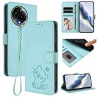 For Realme 11 5G Global / C67 5G India Embossed Heart Cat Leather Phone Case with Hand Strap(Mint Green) - 1