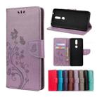 For Nokia 2.4 Butterfly Flower Pattern Horizontal Flip Leather Case with Holder & Card Slots & Wallet(Light Purple) - 1