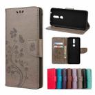 For Nokia 2.4 Butterfly Flower Pattern Horizontal Flip Leather Case with Holder & Card Slots & Wallet(Grey) - 1