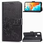 Lucky Clover Pressed Flowers Pattern Leather Case for Huawei Y6 2019, with Holder & Card Slots & Wallet & Hand Strap (Black) - 1