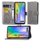 For Huawei Y6P Four-leaf Clasp Embossed Buckle Mobile Phone Protection Leather Case with Lanyard & Card Slot & Wallet & Bracket Function(Gray) - 1