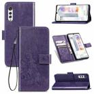 For LG Velvet 5G Four-leaf Clasp Embossed Buckle Mobile Phone Protection Leather Case with Lanyard & Card Slot & Wallet & Bracket Function(Purple) - 1